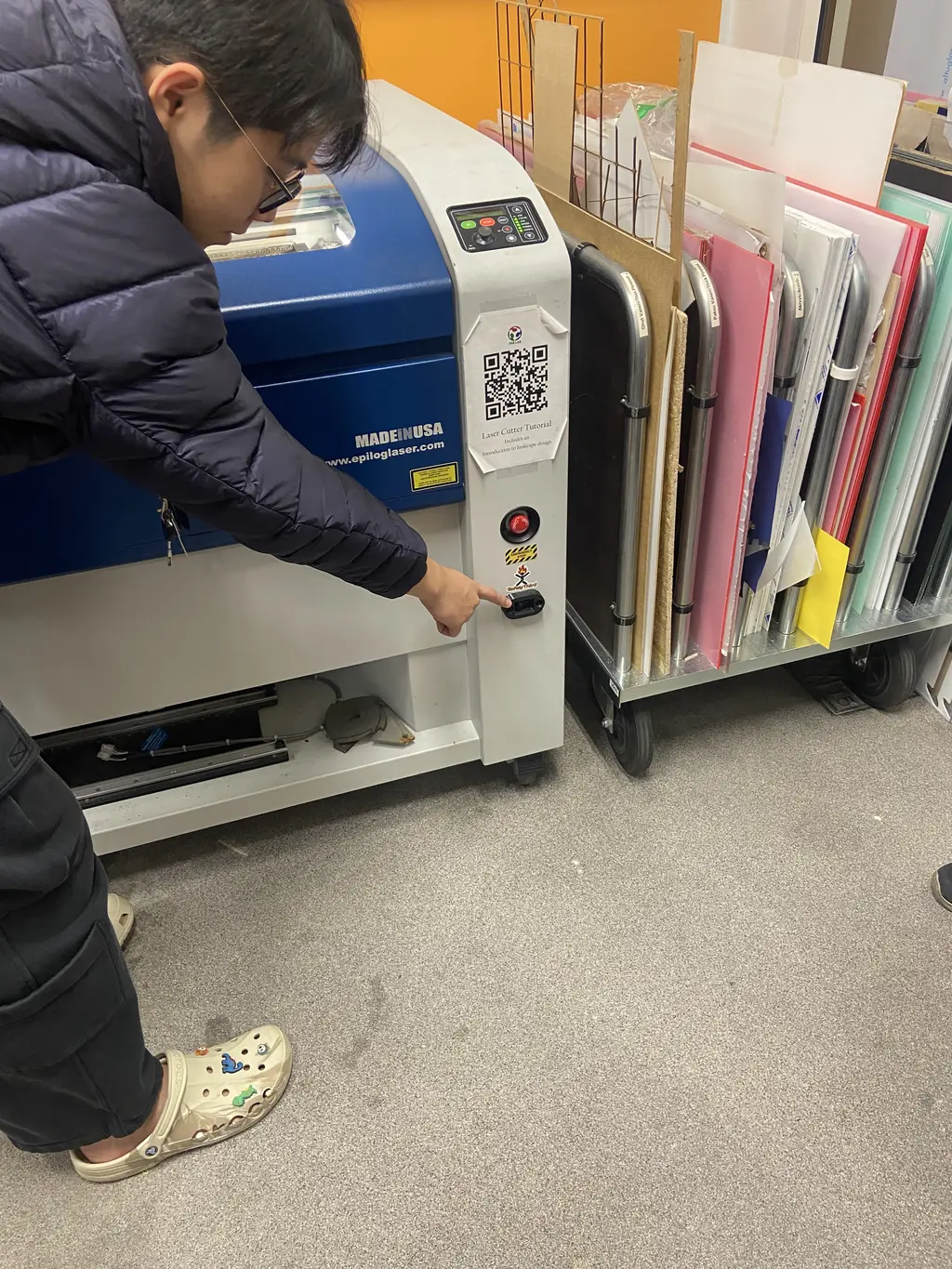 Laser cutter power knob at bottom right of machine
